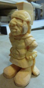 Details in face, breastplate and hand.