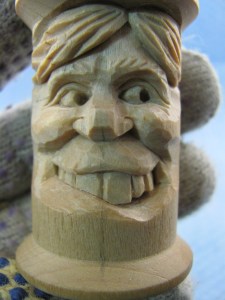 I use a knife tip to divide and shape the teeth. If you need to expose more tooth area, you can do this by lowering the lip line. This will be more difficult after the bottom of the lip is carved. Each tooth on the right side should be shortened a bit as they continue toward the back of the mouth. Think of stair steps.